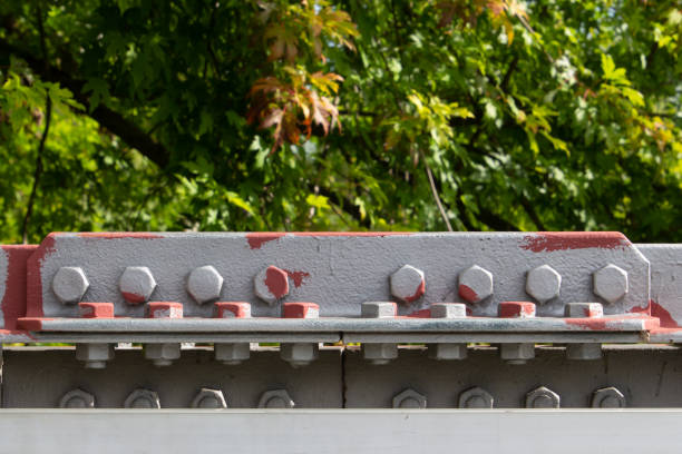 istock Bridge railing connected with bolt and nut painted with primer paint 1345491214