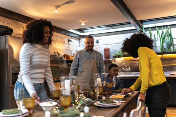 istock Family setting table for lunch/dinner or Christmas at home 1345491462