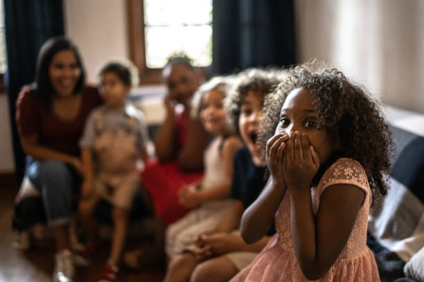istock Surprised kids on Christmas Day (or watching tv) at home 1345491593