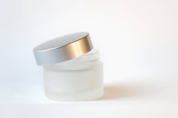 istock jar of cream on a white background 1345493590