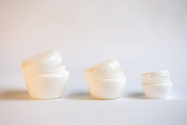 istock jar of cream on a white background 1345493604