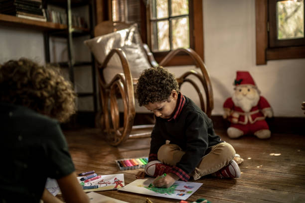 istock Brothers drawing together at home 1345494777