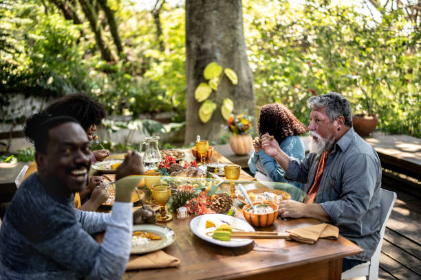 istock Family eating lunch together at home 1345496643