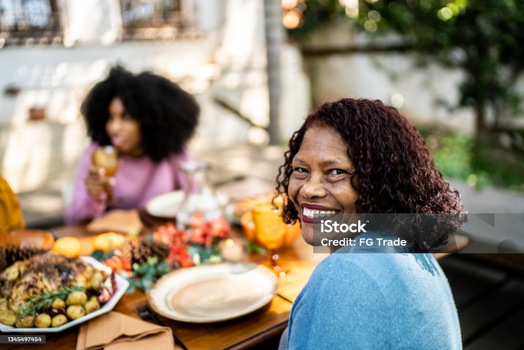 Portrait of a senior woman on the table at home Thanksgiving - Holiday Stock Photo Portrait of a senior woman on the table at home Thanksgiving - Holiday Stock Photo