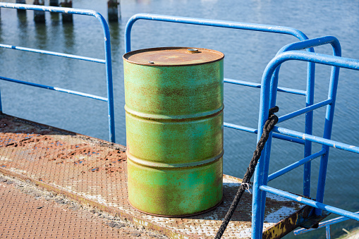 Rusted green barrel in the harbor. Shot with a 35-mm full-frame 61MP Sony A7R IV.