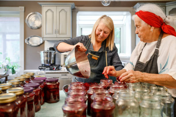 istock Family preparing preserved beets 1345505363