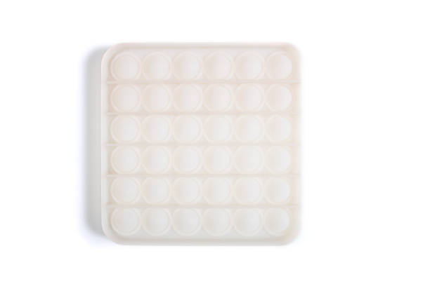 istock Pop it isolated on a white. Silicone antistress toy. 1345507040