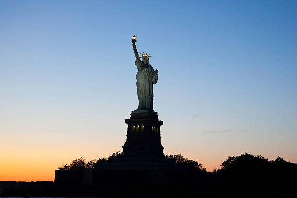 Statue of Liberty Sunset - New York City stock photo