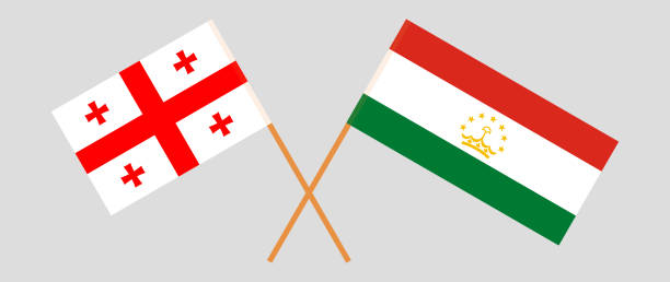 ilustraciones, imágenes clip art, dibujos animados e iconos de stock de banderas cruzadas de georgia y tayikistán. colores oficiales. proporción correcta - georgia football