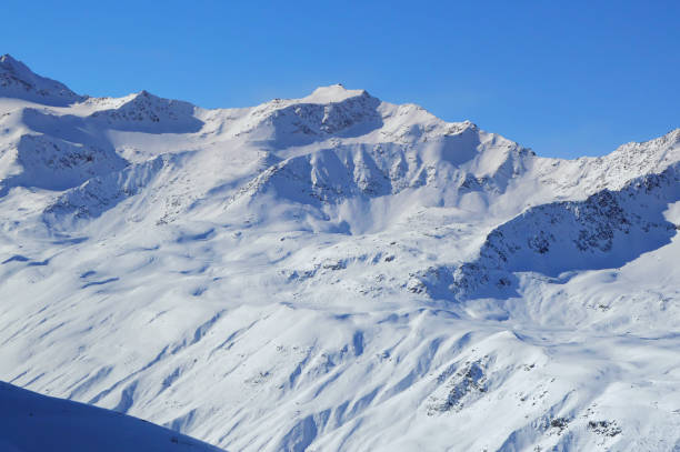 istock Panoramically view over glacier region covered with snow during sunny winter day. 1345511661