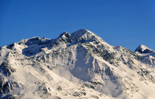istock Panoramically view over glacier region covered with snow during sunny winter day. 1345511739