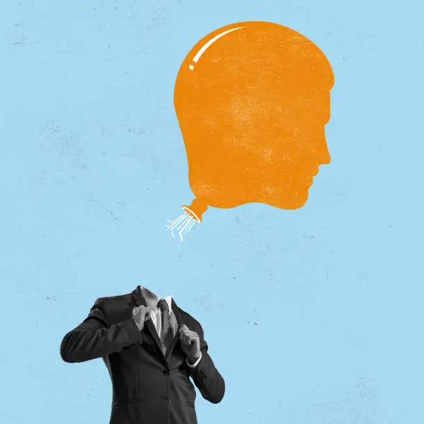 Photo of Contemporary art collage. Male body of model with orange air balloon instead head isolated on blue background. Creativity, mental health concept.