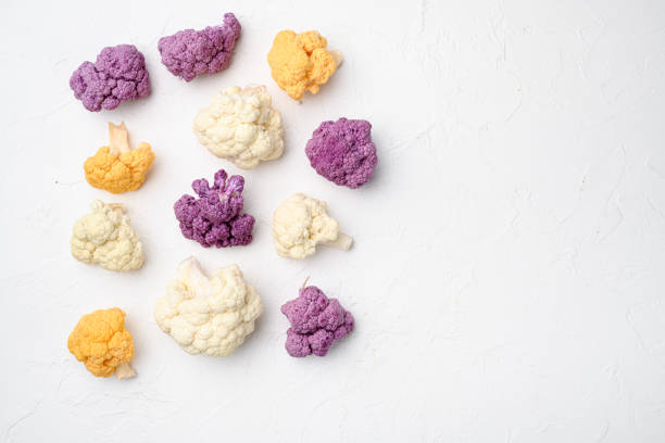 Ripe cauliflower set, on white stone table background, top view flat lay, with copy space for text