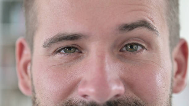 istock Close Up of Young Man Raising Eyebrows 1345516467