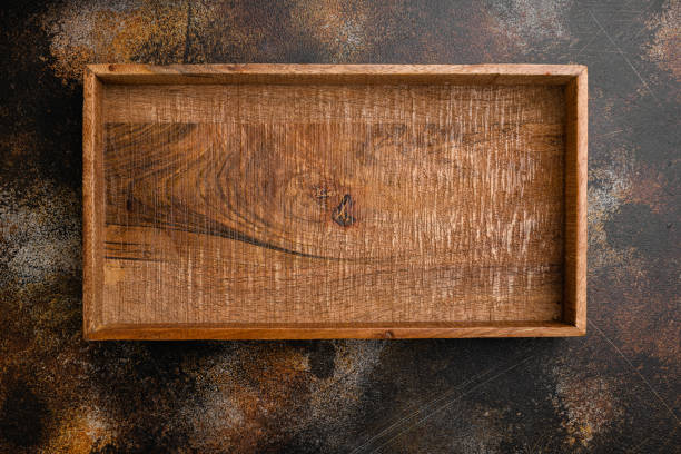istock Rustic wooden box or container with copy space for text or food, top view flat lay , on old dark rustic table background 1345517681
