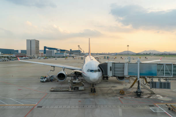 istock At the airport, the plane is picking up passengers 1345518348