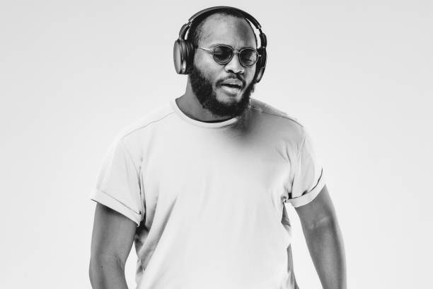 istock One African-American man at the studio. Close up portrait. protest concept. Guy on white background with copy space. 1345520639