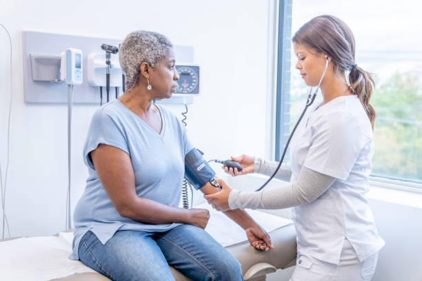 istock Doctor Taking Senior Patients Blood Pressure 1345521690