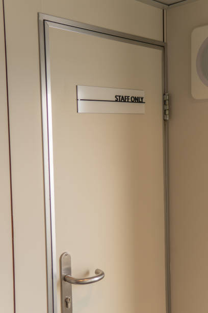 istock Staff only label office text, vintage restricted signage stop, indoor laboratory. Concept doorway entry, announcement design staff only 1345528188
