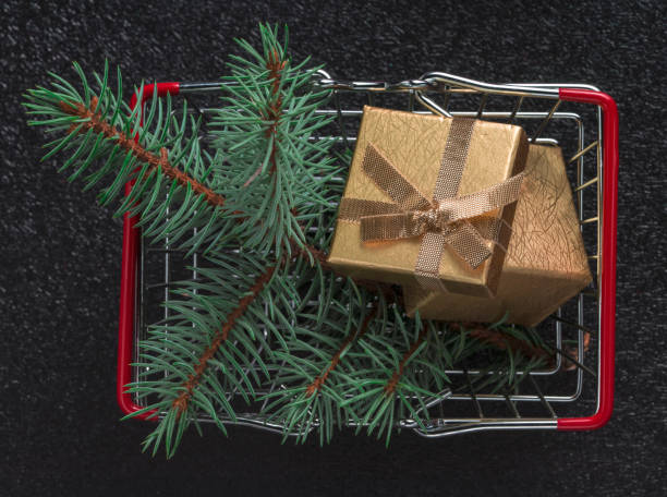 istock gift boxes in supermarket basket 1345528350