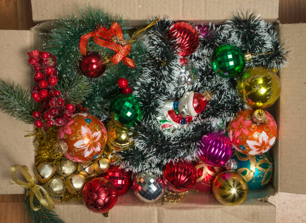 istock christmas decorations in an old cardboard box 1345528554