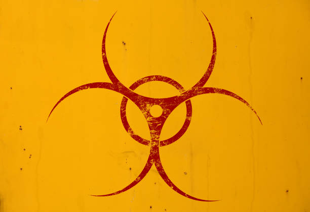 istock Red biohazard sign over yellow background 1345528615