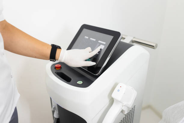 istock Setting the laser for hair removal 1345532015
