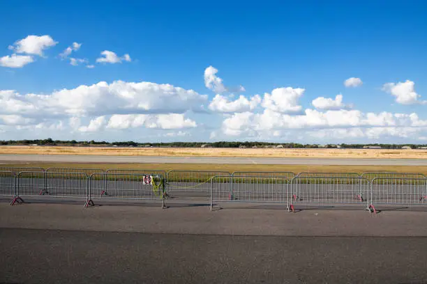 Runway and area of airport Weeze with former army barracks in far background