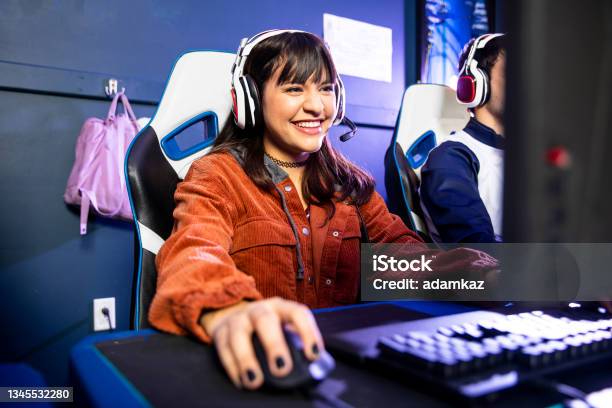 Female Gamer Playing Esports Stock Photo - Download Image Now - Gamer, eSports, Video Game