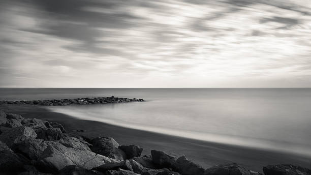 istock beach sea black and white long exposure 1345532365