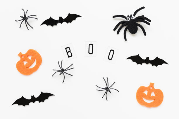 istock Pumpkins, spiders and bats on white background 1345535028