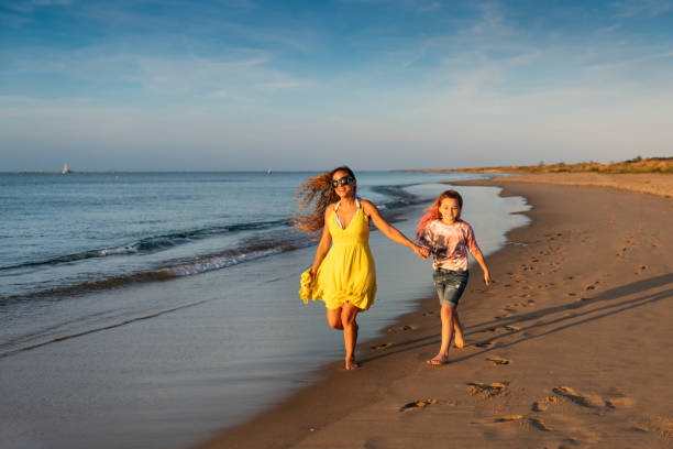 Multiracial family enjoying a day at the beach