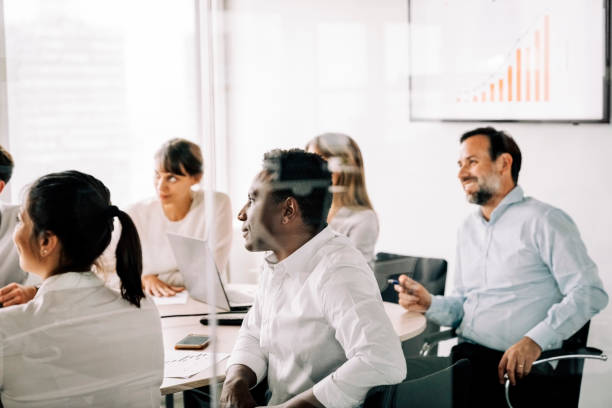istock Business people inside office meeting room 1345535873