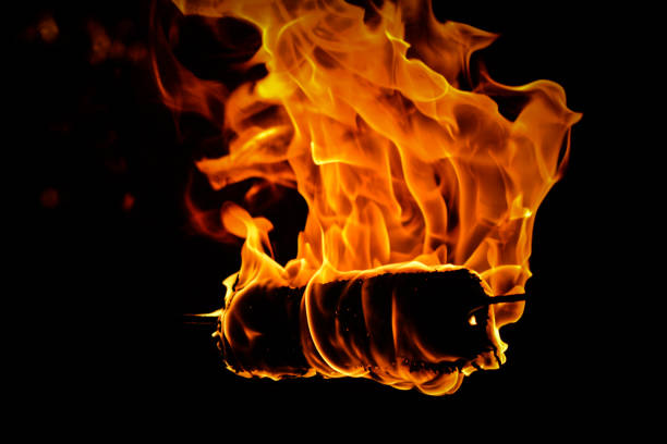 istock Flame of fire on a dark background. 1345535916