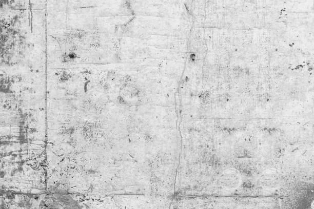 istock white grunge cement or concrete painted wall texture. The white concrete stone. concrete plastered stucco wall painted. 1345537627