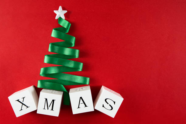 istock Green Christmas Tree Made by Ribbon 1345540344