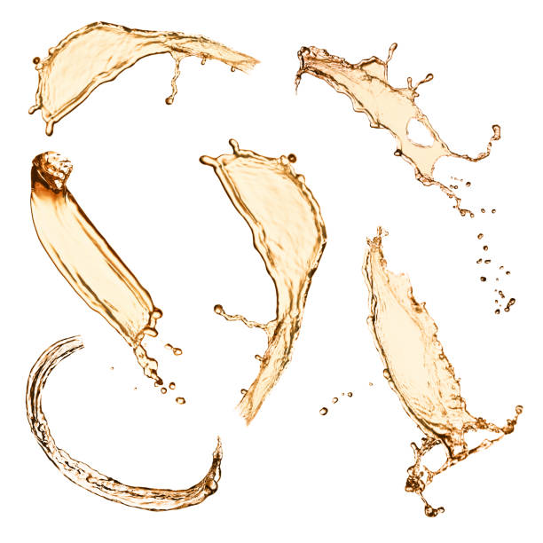 istock Set with abstract splashes of expensive whiskey on white background 1345542468