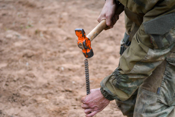 istock Male hands and hammer. 1345543562