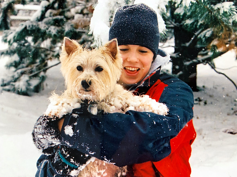 Girl and Carin Terrier in Snow 1997