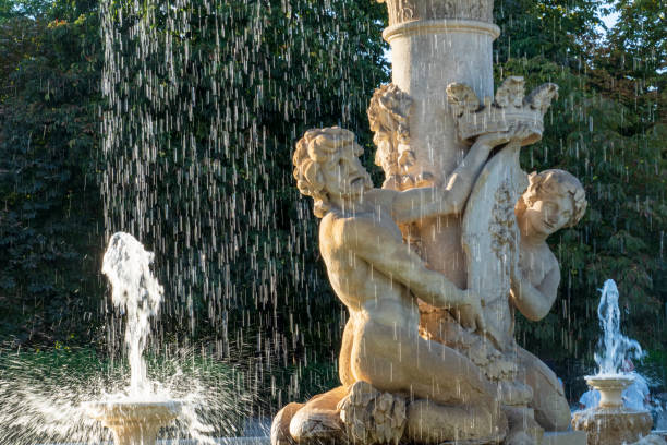 istock Statues in a fountain 1345547120