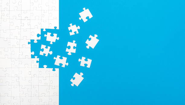 Business concept of white jigsaw puzzle. stock photo