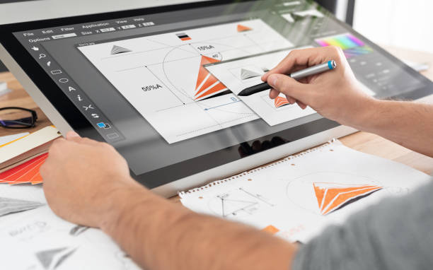 istock Graphic designer drawing sketches logo design. 1345548522