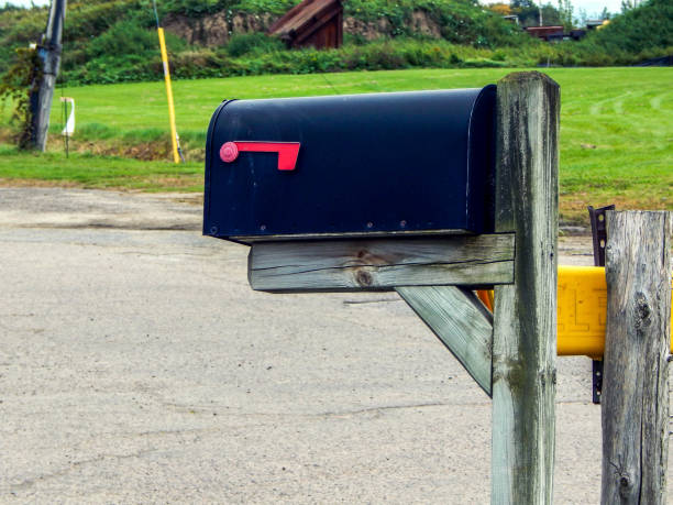 istock Old mailbox by the side of the road 1345549522