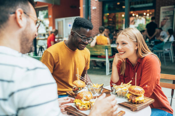istock Friends and fast food 1345550979