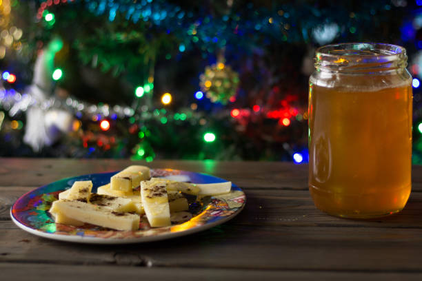 istock Sliced cheese with ground coffee and honey 1345552216