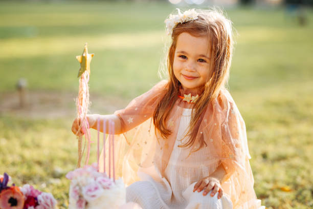 istock Birthday party for cute child 1345553293