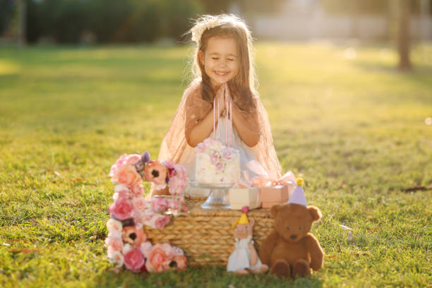istock Birthday party for cute child 1345553312