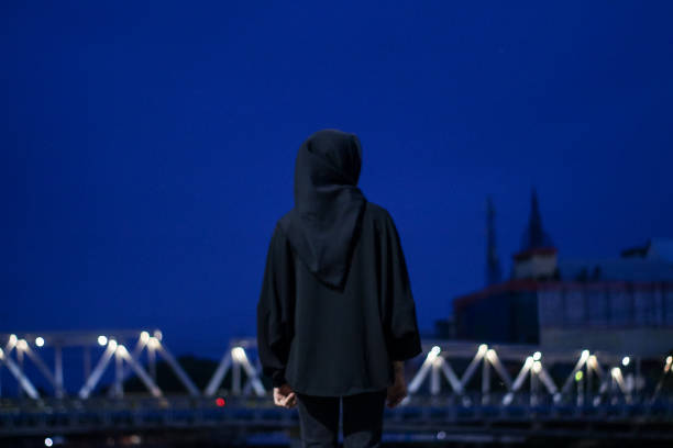istock Young women enjoying night city 1345557449