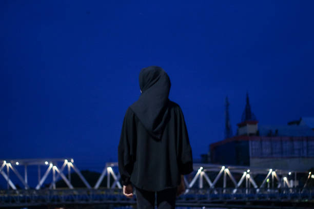 istock Young women enjoying night city 1345557590