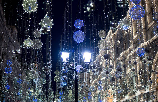 istock Christmas street decoration with lantern 1345561177